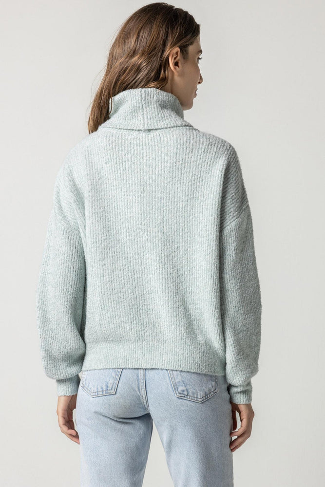 OVERSIZED RIBBED TURTLENECK SWEATER